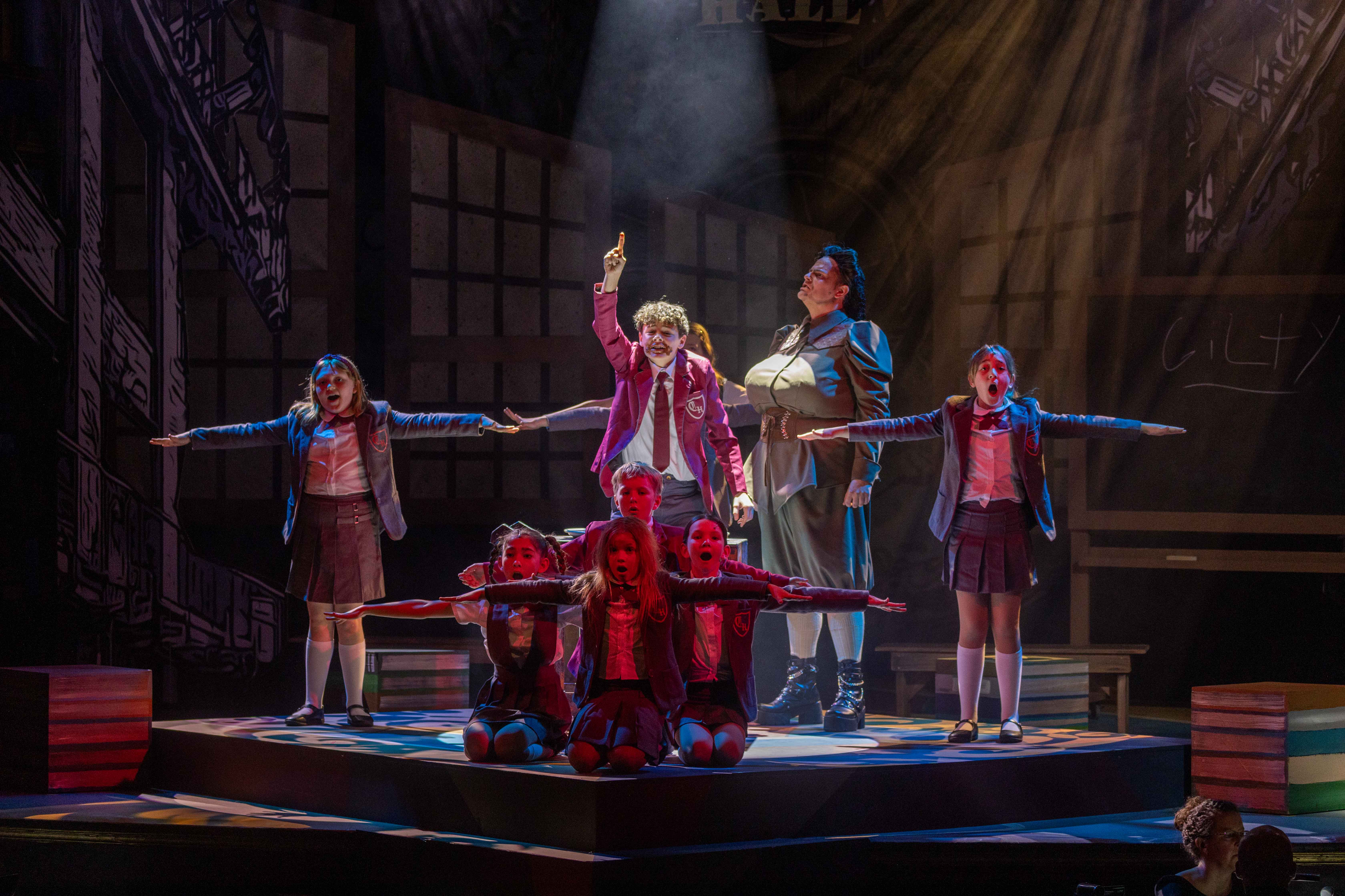 Cool blue-lit stage moment from Matilda